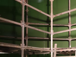 Partial view on the internal surface of the Storage Tank after being re-lined with HR 60 Extra G, green