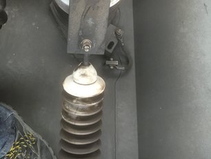 Another Silicone insulator located on the roof of a electric locomotiveson partially cleaned with SAEKA-Cleaning Paste 83.750 for plastic insulators