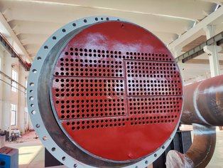 Multi-pass heat exchanger with tube sheets coated in cold-cured Säkatonit K80LS, providing exceptional protection and durability