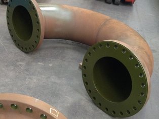 A 180° bend of a Meter Prover Loop lined with Si 14 E