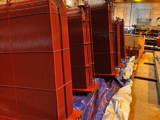 Various Box Coolers right after being re-coated with SÄKATONIT Extra AR-F in Red