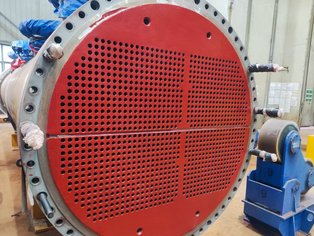 Inlet tube sheet of a large heat exchanger coated with high-build epoxy putty Säkatonit K80LS, providing enhanced protection and durability
